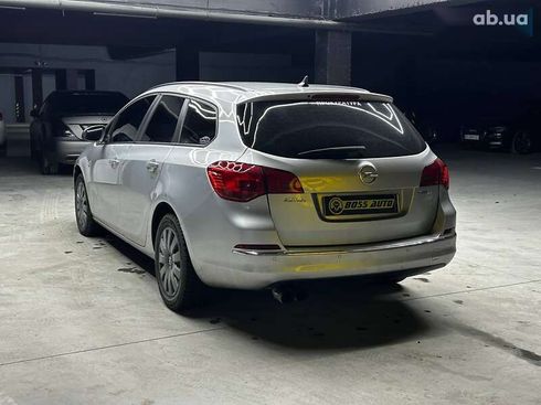 Opel Astra 2013 - фото 4