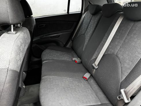 Kia Rio 2008 красный - фото 23