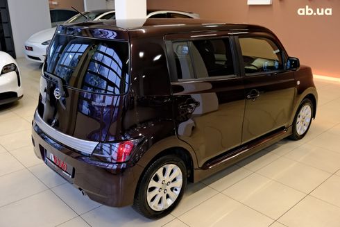Daihatsu Materia 2008 вишневый - фото 5