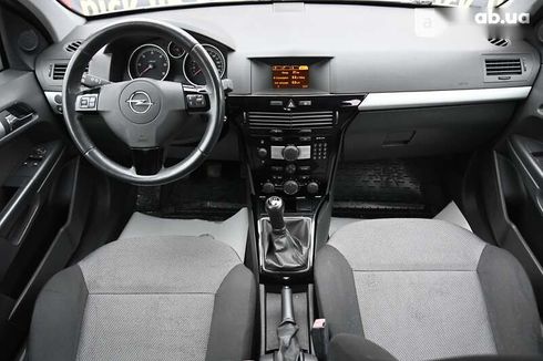 Opel Astra 2010 - фото 22