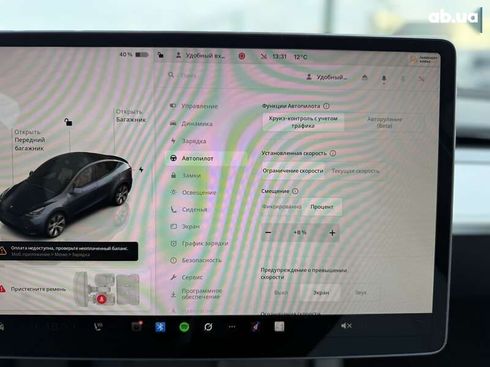 Tesla Model Y 2024 - фото 24