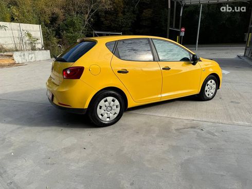 SEAT Ibiza 2011 желтый - фото 5