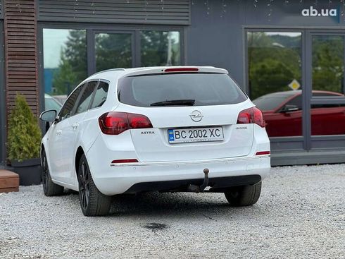 Opel Astra 2014 - фото 10