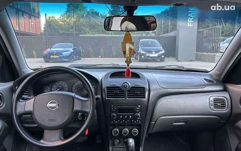 Nissan Almera 2009 - фото 10