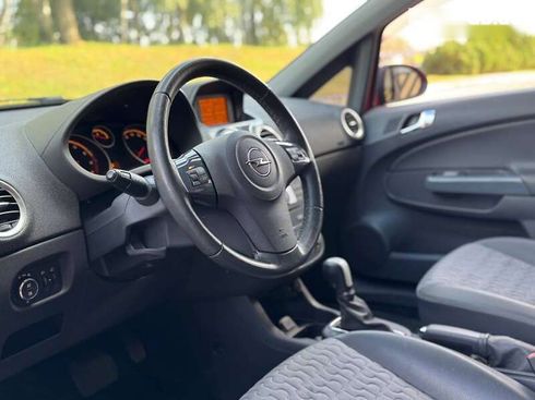 Opel Corsa 2011 - фото 15