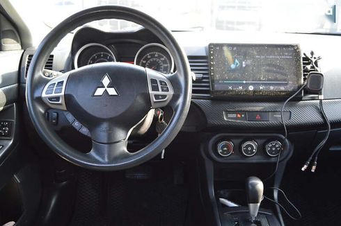 Mitsubishi Lancer 2014 - фото 11