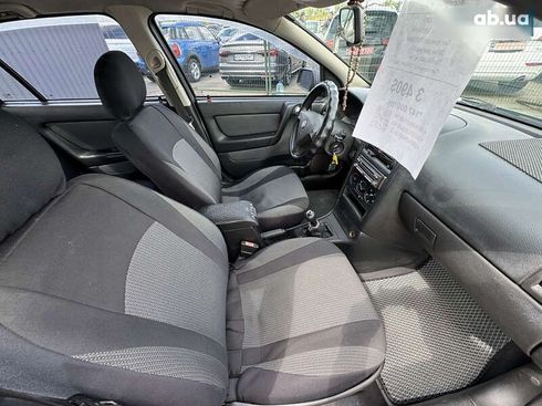 Opel Astra 2007 - фото 25