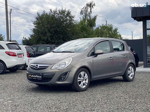 Opel Corsa 2011 - фото 7