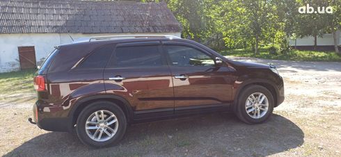 Kia Sorento 2013 вишневый - фото 14