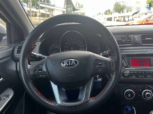 Kia Rio 2013 - фото 12