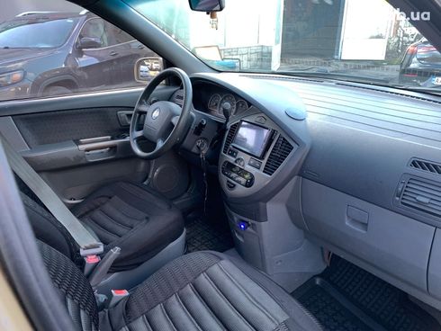 Kia Carens 2003 бежевый - фото 23