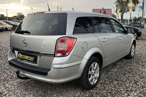 Opel Astra 2010 - фото 6