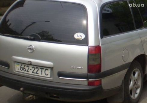 Opel Omega 1998 серебристый - фото 3
