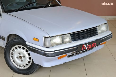 Isuzu Aska 1999 серый - фото 3
