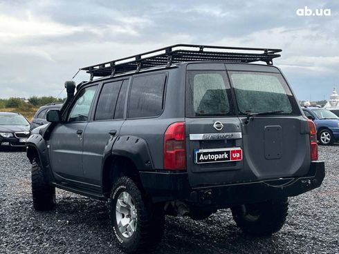 Nissan Patrol 2009 серый - фото 13