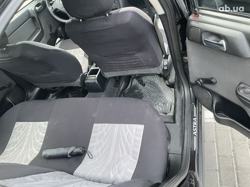 Opel Astra G 2008 черный - фото 7
