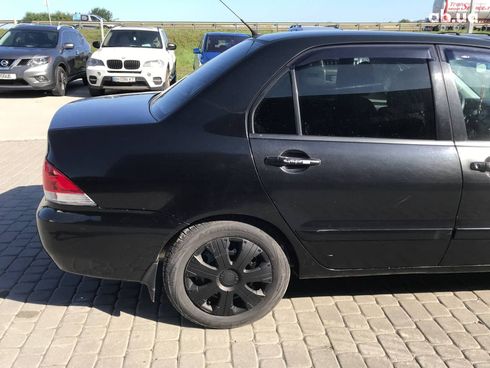 Mitsubishi Lancer 2008 черный - фото 3