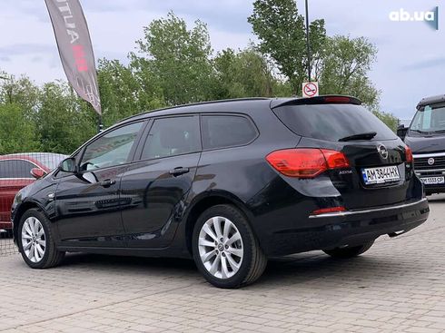Opel Astra 2013 - фото 18