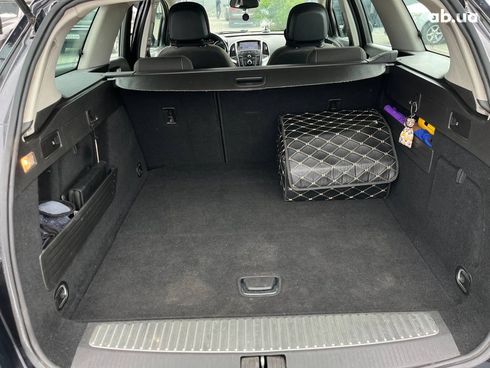 Opel Astra 2011 черный - фото 3