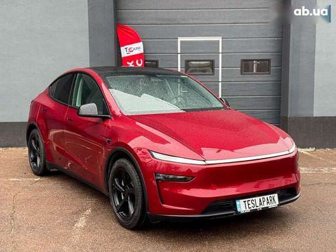 Tesla Model Y 2025 - фото 12