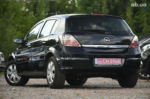 Opel Astra 2009 - фото 8