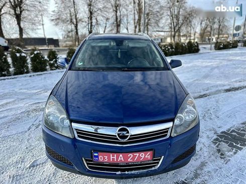 Opel Astra 2010 - фото 14