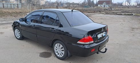 Mitsubishi Lancer 2008 черный - фото 19