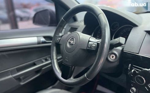 Opel Astra 2010 - фото 16