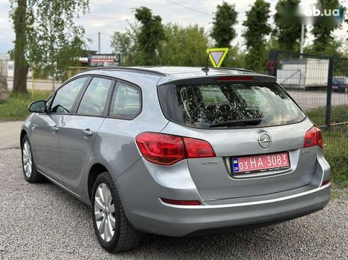 Opel Astra 2010 - фото 15