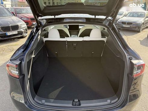 Tesla Model Y 2024 - фото 30