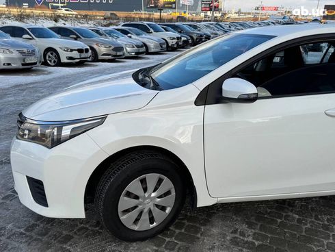 Toyota Corolla 2014 белый - фото 12