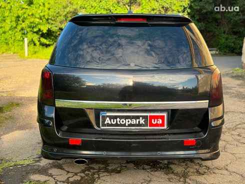 Opel Astra 2009 черный - фото 6