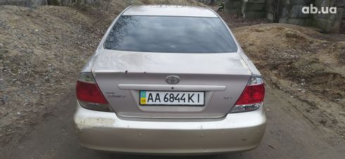Toyota Camry 2006 бежевый - фото 6