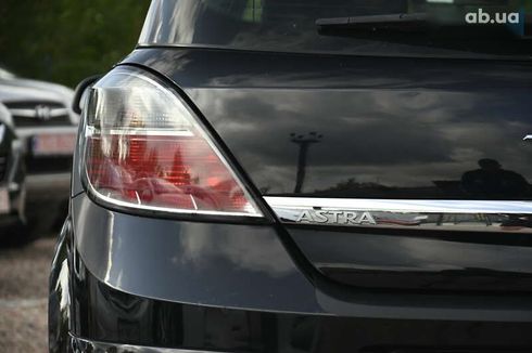 Opel Astra 2009 - фото 12