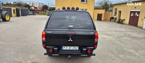 Mitsubishi L200 2007 черный - фото 5