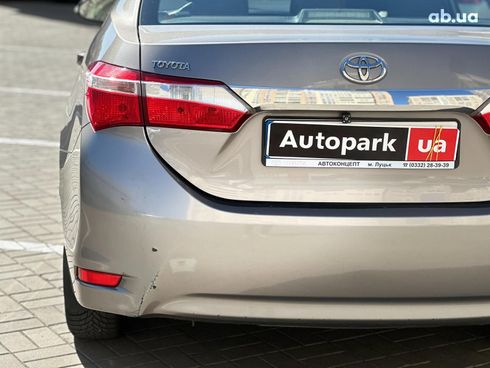 Toyota Corolla 2013 коричневый - фото 8