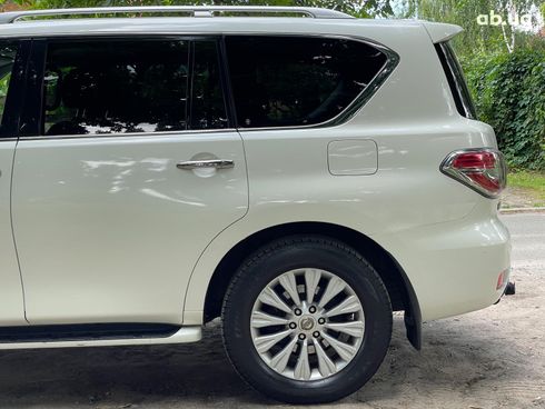 Nissan Patrol 2013 белый - фото 14
