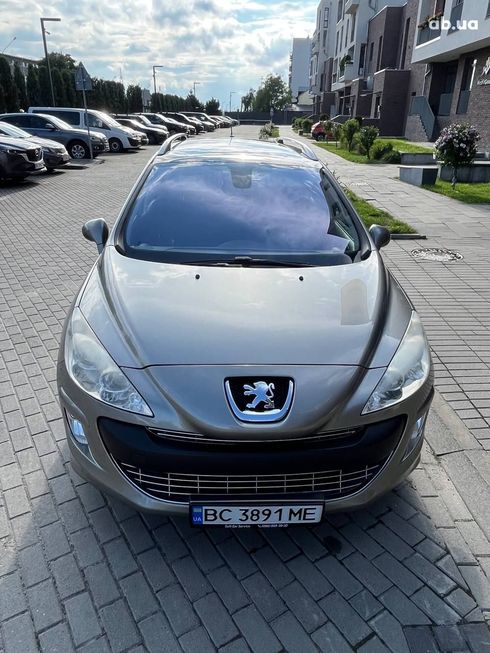 Peugeot 308 2010 серый - фото 4