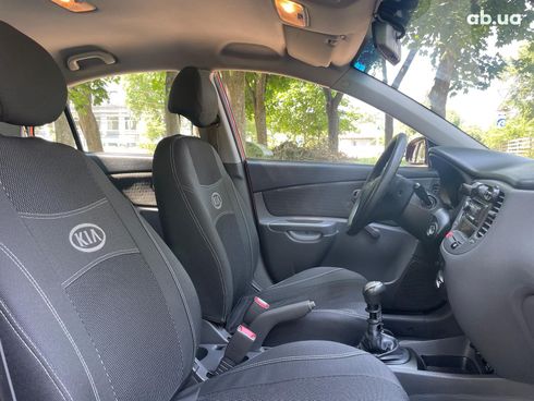 Kia Rio 2008 оранжевый - фото 22