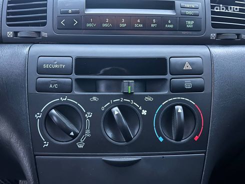 Toyota Corolla 2002 серый - фото 27