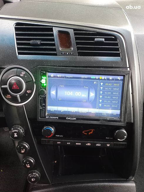SsangYong Kyron 2010 вишневый - фото 19