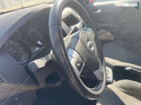 Opel Astra 2012 - фото 14