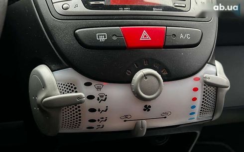 Peugeot 107 2014 - фото 14