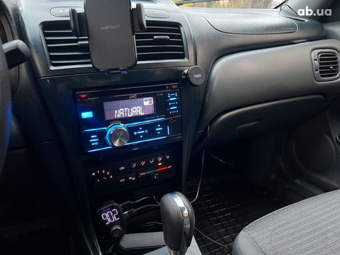 Nissan Almera 2006 бежевый - фото 24