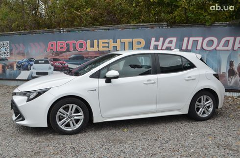 Toyota Corolla 2019 белый - фото 8