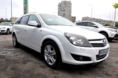 Opel Astra 2010 - фото 14