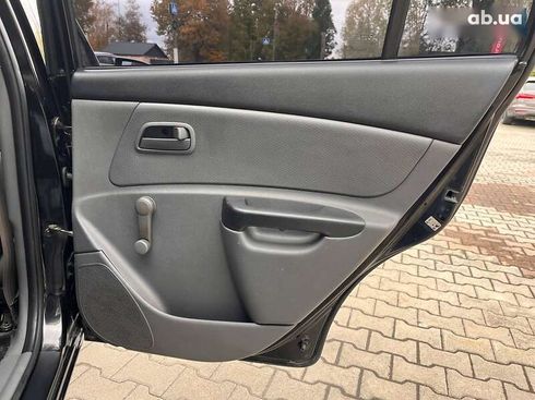Kia Rio 2009 - фото 24