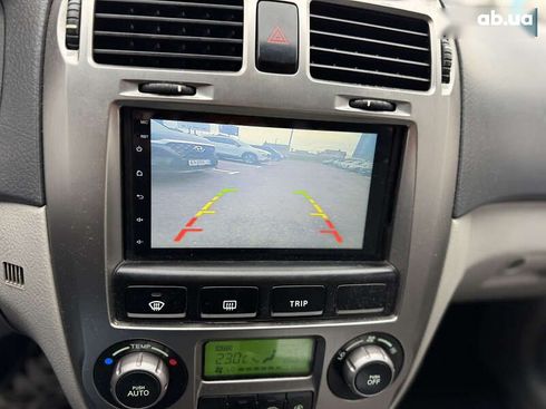 Kia Cerato 2006 - фото 17