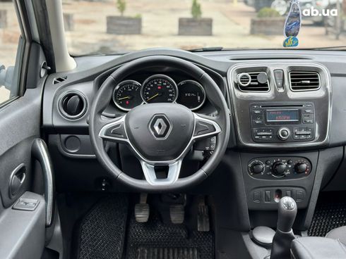Renault Logan MCV 2017 белый - фото 11