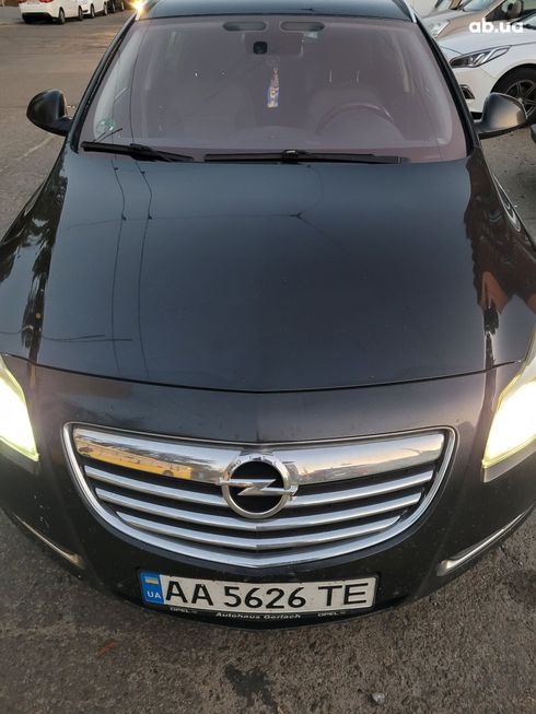 Opel Insignia Sports Tourer 2010 черный - фото 9